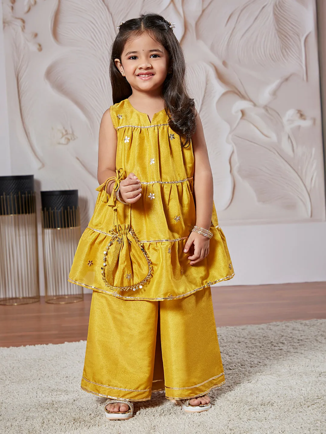 VASTRAMAY Girls' Mustard Kurta Palazzo Set With Potli